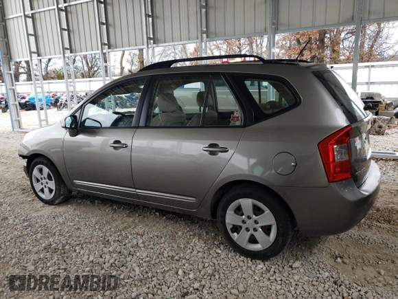 2009 Kia Rondo LX with VIN KNAFG526297252855, listed as a Copart auction lot 84956504 with 83,351 mi miles and Salvage Title. Bid and sale history available at carsss.com. Image 2.