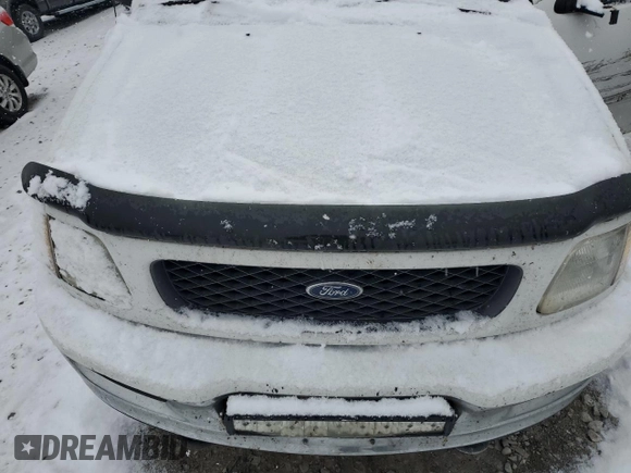 1998 Ford F-150 with VIN 1FTRF18L9WNB61551, listed as a Copart auction lot 82864544 with Not provided miles and Salvage title. Bid and sale history available at DreamBid. Image 12.
