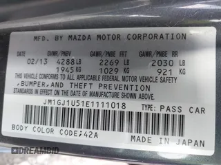 2014 Mazda 6 i Sport with VIN JM1GJ1U51E1111018, listed as a IAAI auction lot 41875461 with 253,755 mi miles and . Bid and sale history available at DreamBid. Image 9.