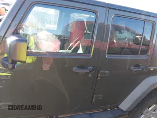 2015 Jeep Wrangler Unlimited Sport with VIN 1C4BJWDG5FL745673, listed as a IAAI auction lot 41681043 with 97,605 mi miles and . Bid and sale history available at DreamBid. Image 14.