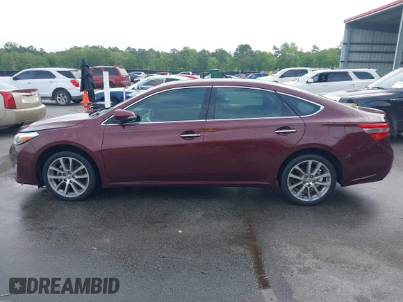 2014 Toyota Avalon Limited with VIN 4T1BK1EB3EU113035, listed as a IAAI auction lot 42040239 with 118,609 mi miles. Bid and sale history available at carsss.com. Image 13.