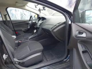 2017 Ford Focus SE with VIN 1FADP3F2XHL263071, listed as a IAAI auction lot 42046106 with 91,633 mi miles and . Bid and sale history available at DreamBid. Image 5.