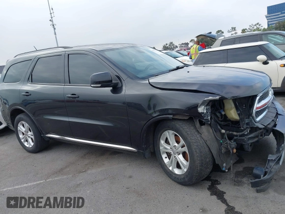 2012 Dodge Durango Crew with VIN 1C4SDHDT0CC321037, listed as a IAAI auction lot 42793232 with 162,593 mi miles and . Bid and sale history available at DreamBid. Image 14.