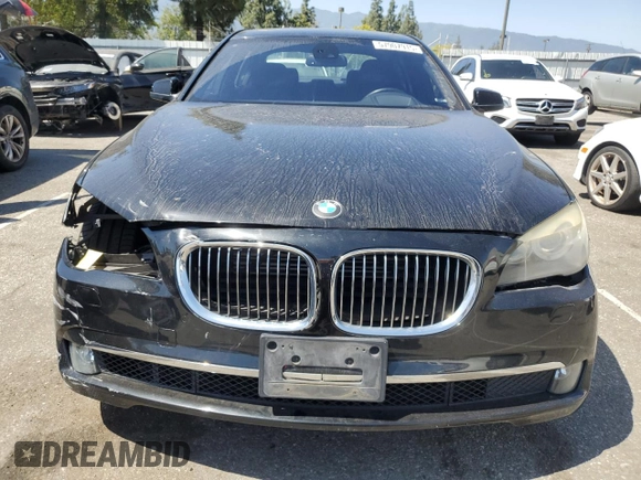 2011 BMW 7 Series with VIN WBAKX8C55BC198292, listed as a Copart auction lot 57907915 with 76,478 mi miles and Salvage title. Bid and sale history available at DreamBid. Image 5.
