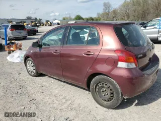 2009 Toyota Yaris with VIN JTDKT903095229132, listed as a Copart auction lot 51512655 with 183,963 mi miles and Salvage Title. Bid and sale history available at carsss.com. Image 2.