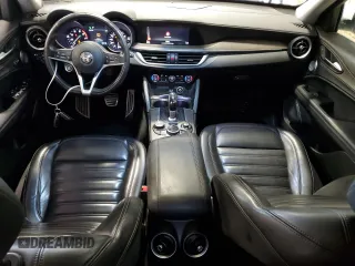 2019 Alfa Romeo Stelvio Ti z VIN ZASPAKBN4K7C49127, wystawiony jako Copart lot #57079975 z przebiegiem 55 557 mil mil oraz Szkoda całkowita • Salvage title. Historia ofert i sprzedaży dostępna na DreamBid. Obrazek 8.