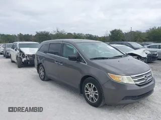 2013 Honda Odyssey EX-L с VIN 5FNRL5H60DB015707, выставлен на аукционе IAAI как лот 41544722 с пробегом 170 709 миль миль и . История ставок и продаж доступна на DreamBid. Изображение 1.