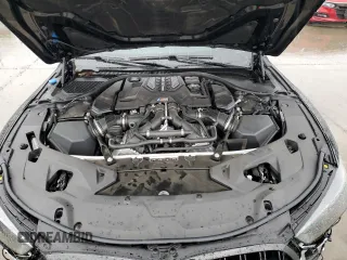 2024 BMW M8 Competition with VIN WBSGV0C01RCP37305, listed as a Copart auction lot 44357135 with 8,160 mi miles and Salvage Title. Bid and sale history available at carsss.com. Image 12.