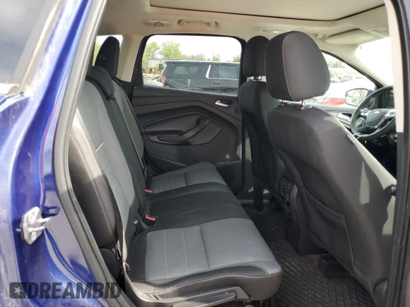 2014 Ford Escape SE z VIN 1FMCU9GX6EUD93636, wystawiony jako Copart lot #54245245 z przebiegiem 146 363 mil mil oraz Czysty tytuł • Clean title. Historia ofert i sprzedaży dostępna na DreamBid. Obrazek 11.