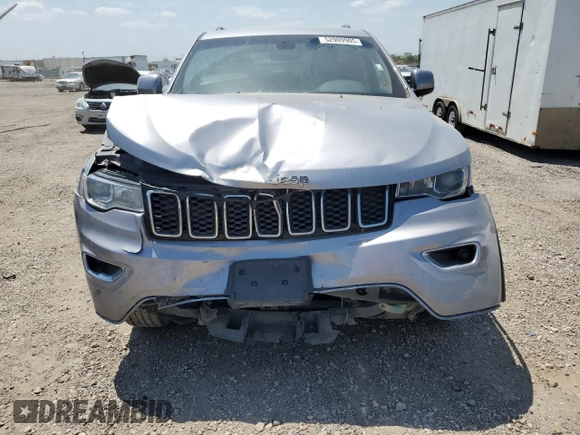 2017 Jeep Grand Cherokee Laredo with VIN 1C4RJEAG0HC816410, listed as a Copart auction lot 52909905 with 102,326 mi miles and Salvage title. Bid and sale history available at DreamBid. Image 5.