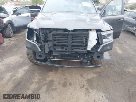 2022 Ram 1500 Laramie with VIN 1C6SRFJT3NN400159, listed as a IAAI auction lot 42167812 with 16,790 mi miles and . Bid and sale history available at DreamBid. Image 6.