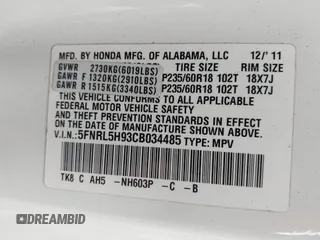 2012 Honda Odyssey Touring with VIN 5FNRL5H93CB034485, listed as a IAAI auction lot 42304502 with 198,589 mi miles and . Bid and sale history available at DreamBid. Image 9.