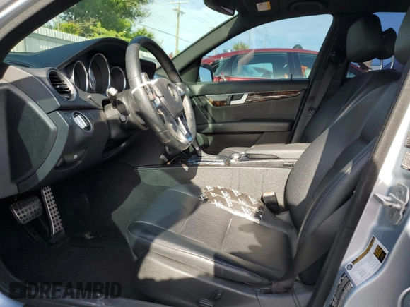 2014 Mercedes-Benz C 250 Sport with VIN WDDGF4HB8EA955064, listed as a Copart auction lot 63184135 with 104,735 mi miles and Salvage title. Bid and sale history available at DreamBid. Image 7.