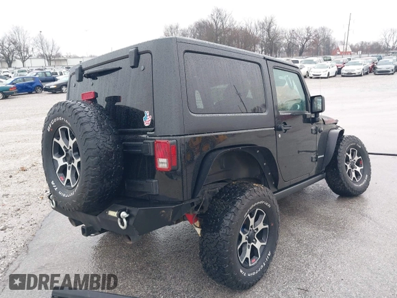 2012 Jeep Wrangler Rubicon with VIN 1C4BJWCG4CL106746, listed as a IAAI auction lot 41162452 with 134,911 mi miles and . Bid and sale history available at DreamBid. Image 4.