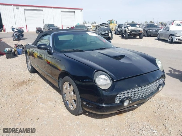 2002 Ford Thunderbird w/Hardtop Premium with VIN 1FAHP60A72Y129115, listed as a IAAI auction lot 41768100 with NaN miles. Bid and sale history available at carsss.com. Image 13.