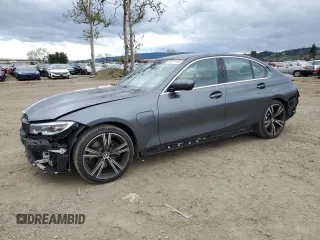 2021 BMW 3 Series 330e with VIN 3MW5P7J02M8B94208, listed as a Copart auction lot 48971455 with 22,228 mi miles and Salvage Title. Bid and sale history available at carsss.com. Image 1.