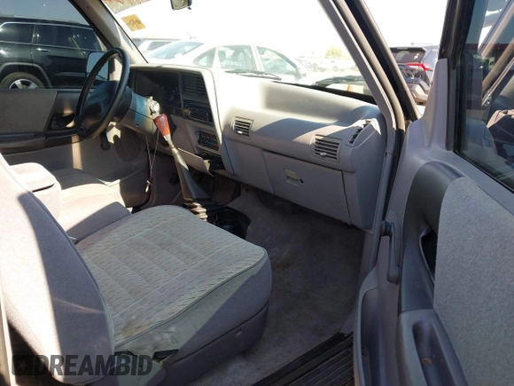 1993 Ford Ranger STX z VIN 1FTCR14A6PPB80601, wystawiony jako IAAI lot #42436006 z przebiegiem 59 656 mil mil oraz . Historia ofert i sprzedaży dostępna na DreamBid. Obrazek 5.