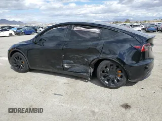 2021 Tesla Model Y Long Range with VIN 5YJYGDEEXMF188737, listed as a Copart auction lot 49117605 with 49,201 mi miles and Salvage Title. Bid and sale history available at DreamBid. Image 2.