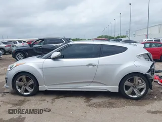 2013 Hyundai Veloster Turbo z VIN KMHTC6AE2DU122273, wystawiony jako IAAI lot #42174272 z przebiegiem 157 152 mil mil oraz . Historia ofert i sprzedaży dostępna na DreamBid. Obrazek 15.