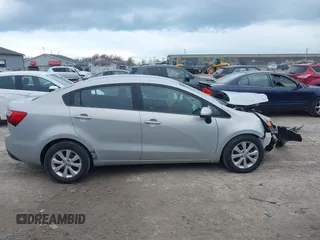 2014 Kia Rio EX with VIN KNADN4A36E6338670, listed as a IAAI auction lot 42035501 with 166,561 mi miles. Bid and sale history available at carsss.com. Image 13.