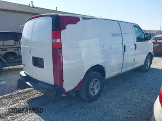 2017 Chevrolet Express Cargo Van with VIN 1GCWGAFF1H1289211, listed as a IAAI auction lot 42060982 with 81,529 mi miles. Bid and sale history available at carsss.com. Image 4.