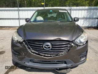 2016 Mazda CX-5 Sport with VIN JM3KE4BY4G0805179, listed as a Copart auction lot 52412745 with 85,928 mi miles and Salvage Title. Bid and sale history available at carsss.com. Image 5.