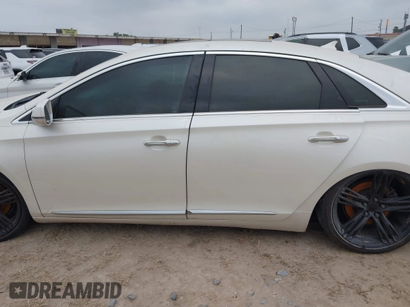 2013 Cadillac XTS Platinum z VIN 2G61U5S3XD9208737, wystawiony jako IAAI lot #41928451 z przebiegiem 167 984 mil mil oraz . Historia ofert i sprzedaży dostępna na DreamBid. Obrazek 14.