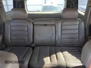2003 Hummer H2 z VIN 5GRGN23U33H121992, wystawiony jako Copart lot #50388175 z przebiegiem 237 169 mil mil oraz Czysty tytuł • Clean title. Historia ofert i sprzedaży dostępna na DreamBid. Obrazek 10.