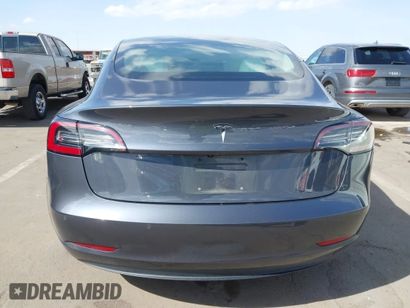 2018 Tesla Model 3 Long Range Battery with VIN 5YJ3E1EA5JF169097, listed as a IAAI auction lot 41916873 with 81,919 mi miles. Bid and sale history available at carsss.com. Image 16.