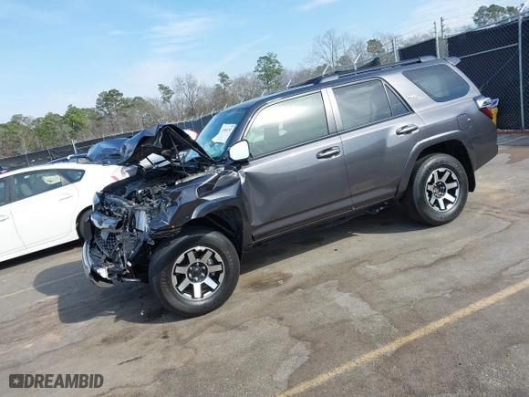 2021 Toyota 4Runner TRD Off Road with VIN JTEPU5JR0M5877962, listed as a IAAI auction lot 41683297 with 61,539 mi miles. Bid and sale history available at carsss.com. Image 2.
