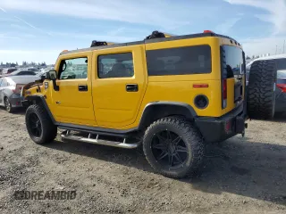 2006 Hummer H2 with VIN 5GRGN23U26H100166, listed as a Copart auction lot 87228964 with 71,727 mi miles and Salvage Title. Bid and sale history available at carsss.com. Image 2.
