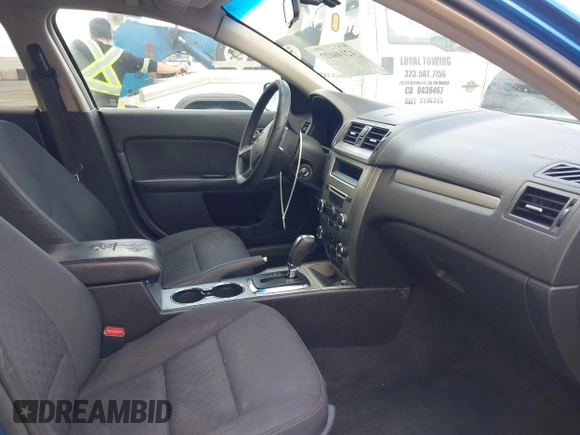 2012 Ford Fusion SE with VIN 3FAHP0HA9CR351141, listed as a IAAI auction lot 42140427 with 219,049 mi miles. Bid and sale history available at carsss.com. Image 5.