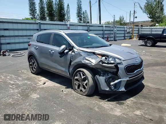 2020 Kia Sportage EX с VIN KNDPN3AC3L7791145, выставлен на аукционе Copart как лот 57281625 с пробегом 84 065 миль миль и Списание • Salvage title. История ставок и продаж доступна на DreamBid. Изображение 14.