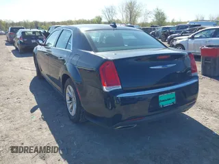 2018 Chrysler 300 Touring with VIN 2C3CCAAG2JH320573, listed as a IAAI auction lot 42134350 with 90,929 mi miles and . Bid and sale history available at DreamBid. Image 3.
