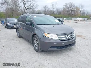 2012 Honda Odyssey EX-L with VIN 5FNRL5H66CB112845, listed as a IAAI auction lot 42006590 with 187,832 mi miles. Bid and sale history available at carsss.com. Image 1.