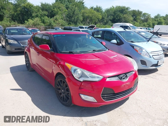 2013 Hyundai Veloster w/Black Int with VIN KMHTC6AD9DU135318, listed as a IAAI auction lot 42632212 with 97,485 mi miles and . Bid and sale history available at DreamBid. Image 1.