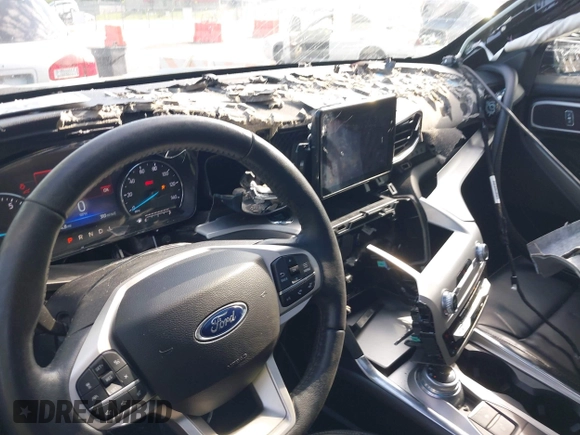 2022 Ford Explorer XLT with VIN 1FMSK8DH9NGB27633, listed as a IAAI auction lot 42117559 with 52,474 mi miles and . Bid and sale history available at DreamBid. Image 6.