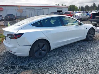 2020 Tesla Model 3 Long Range z VIN 5YJ3E1EB5LF619018, wystawiony jako IAAI lot #42131960 z przebiegiem 29 774 mil mil oraz . Historia ofert i sprzedaży dostępna na DreamBid. Obrazek 4.
