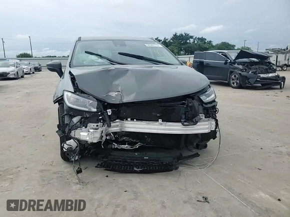 2023 Chrysler Pacifica Hybrid Touring L with VIN 2C4RC1L72PR614075, listed as a Copart auction lot 58586115 with 43,960 mi miles and Salvage title. Bid and sale history available at DreamBid. Image 13.