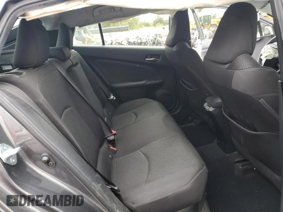 2019 Toyota Prius L Eco z VIN JTDKARFU0K3087436, wystawiony jako Copart lot #55699135 z przebiegiem Nie podano mil oraz Szkoda całkowita • Salvage title. Historia ofert i sprzedaży dostępna na DreamBid. Obrazek 10.