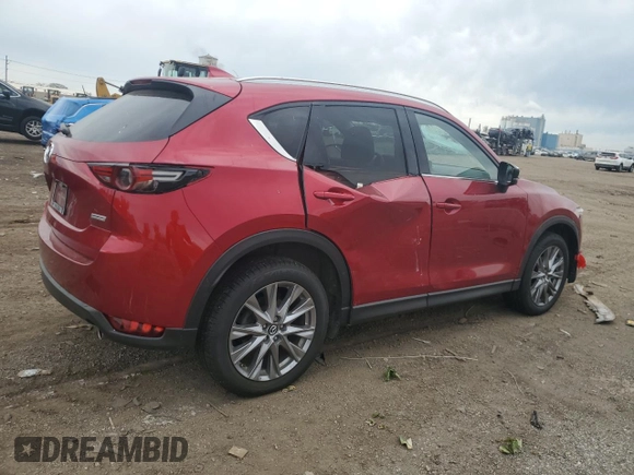 2019 Mazda CX-5 Grand Touring z VIN JM3KFBDM2K0665993, wystawiony jako Copart lot #58440685 z przebiegiem 38 306 mil mil oraz Szkoda całkowita • Salvage title. Historia ofert i sprzedaży dostępna na DreamBid. Obrazek 3.