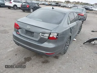 2013 Volkswagen Jetta GLI Autobahn with VIN 3VW4A7AJXDM216548, listed as a IAAI auction lot 40725175 with 147,939 mi miles and . Bid and sale history available at DreamBid. Image 4.