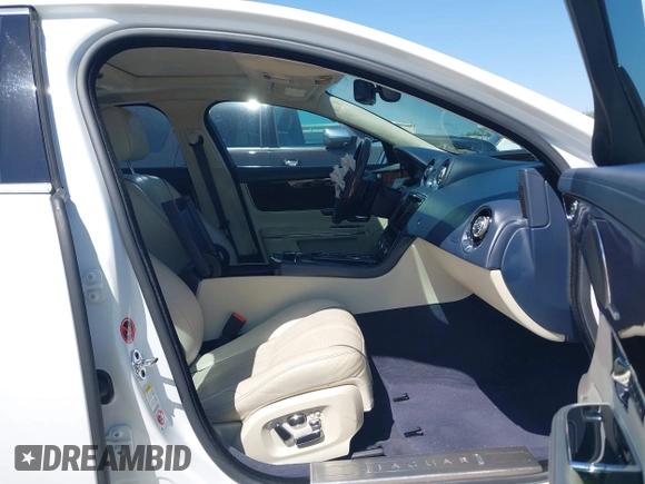 2012 Jaguar XJ XJL with VIN SAJWA2GB3CLV38500, listed as a IAAI auction lot 41990409 with 73,793 mi miles and . Bid and sale history available at DreamBid. Image 5.