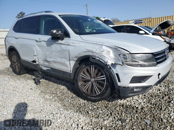 2018 Volkswagen Tiguan SEL with VIN 3VV3B7AX0JM014461, listed as a Copart auction lot 49785725 with 124,868 mi miles and Salvage Title. Bid and sale history available at DreamBid. Image 4.