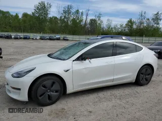 2020 Tesla Model 3 Long Range z VIN 5YJ3E1EB9LF801059, wystawiony jako Copart lot #58312495 z przebiegiem Nie podano mil oraz Szkoda całkowita • Salvage title. Historia ofert i sprzedaży dostępna na DreamBid. Obrazek 1.
