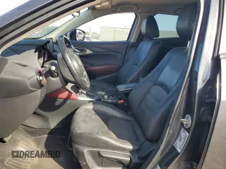 2017 Mazda CX-3 Touring z VIN JM1DKDC77H0151148, wystawiony jako Copart lot #81897434 z przebiegiem Nie podano mil oraz Szkoda całkowita • Salvage title. Historia ofert i sprzedaży dostępna na DreamBid. Obrazek 7.