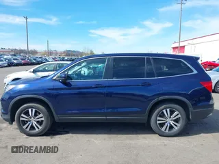 2016 Honda Pilot EX-L with VIN 5FNYF6H5XGB102213, listed as a IAAI auction lot 41861702 with 119,655 mi miles. Bid and sale history available at carsss.com. Image 14.