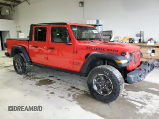 2020 Jeep Gladiator Rubicon with VIN 1C6JJTBG8LL155550, listed as a Copart auction lot 58327875 with 34,276 mi miles and Salvage title. Bid and sale history available at DreamBid. Image 4.