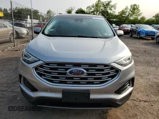2021 Ford Edge Titanium with VIN 2FMPK4K91MBA12380, listed as a Copart auction lot 59275785 with 82,295 mi miles and Salvage title. Bid and sale history available at DreamBid. Image 5.