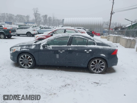 2015 Volvo S60 T5 Premier with VIN YV1612TK6F1348608, listed as a IAAI auction lot 41229153 with 73,019 mi miles. Bid and sale history available at carsss.com. Image 14.